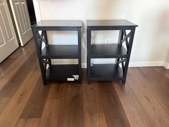 2 black wood nightstands