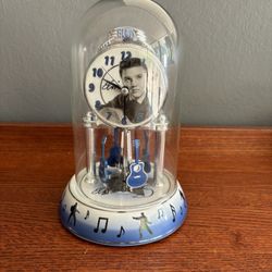 ELVIS PRESLEY Silver Anniversary Clock Porcelain Base Guitars Rotate Glass Dome