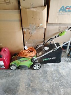 Greenworks corded lawnmower w/100ft extension cord.