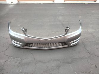 2011-2014 Mercedes C250/300 Front Bumper With Fog Lights With Accessories And Inner Fillers With Accessories OEM.
