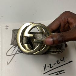 Brown Guccis belt