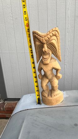 Tiki man carved in Hawaii Tiki man carved in Hawaii