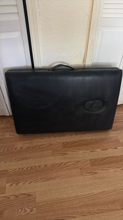 Massage table