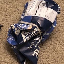 Half Eaten Bag Of Sea Salt & Vinegar Chips