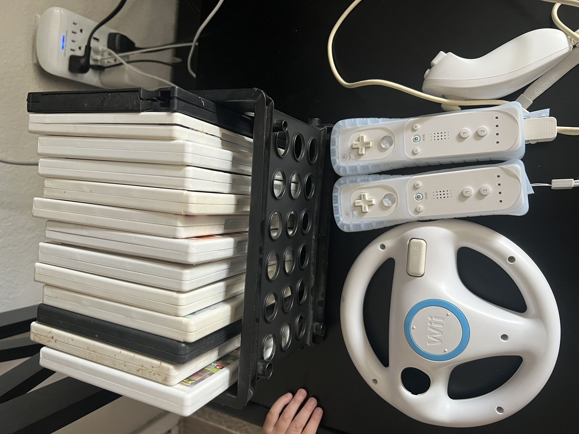 Wii Console, Controller, Games And HDMI cable.