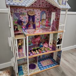 Huge Doll House. 3 Stories With Elevator and 14  dolls Included 