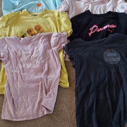 8  Size Large Tshirts 