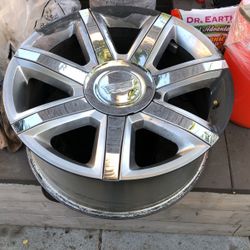 2 Cadillac tire rims 