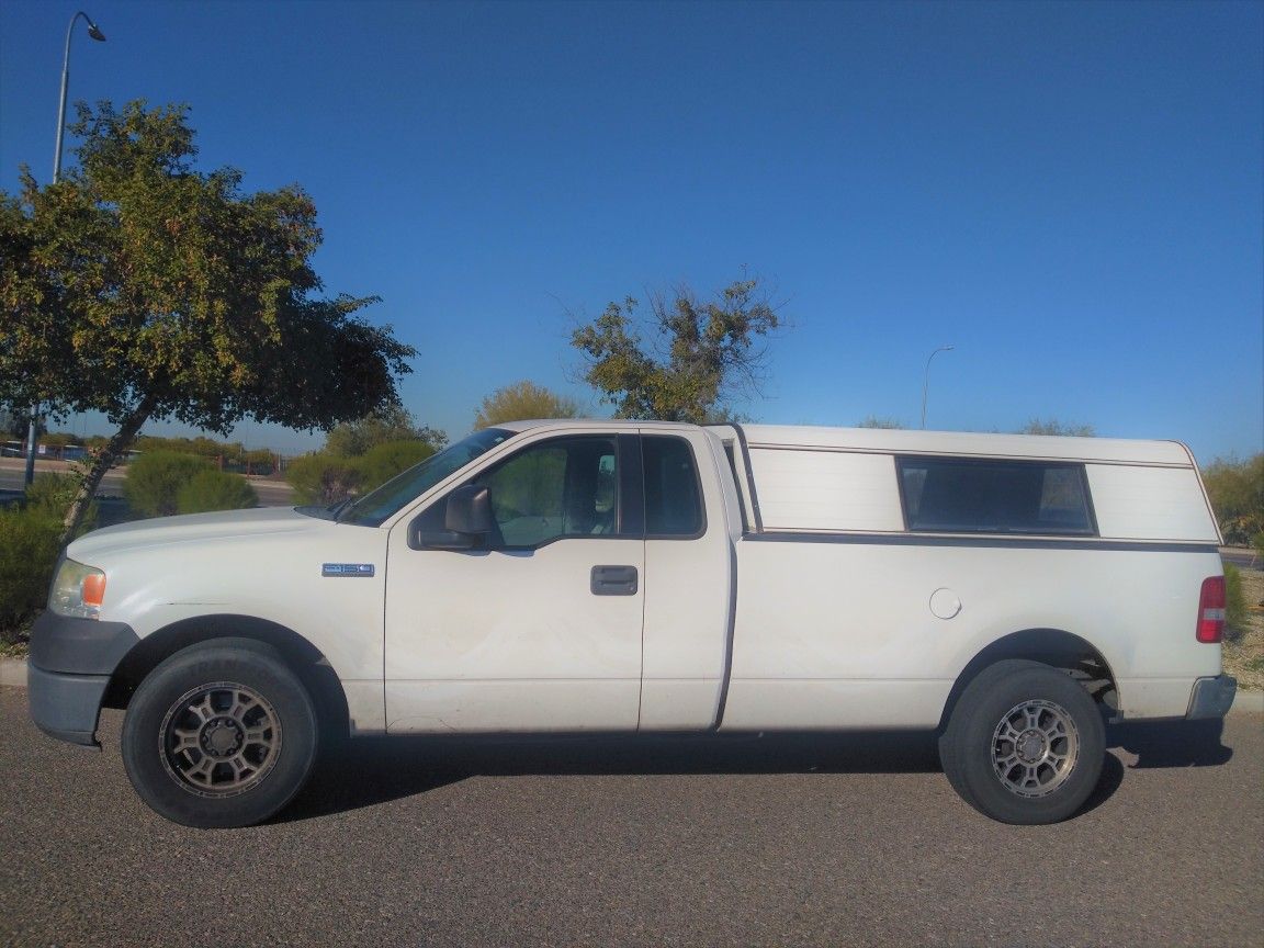 WORK TRUCK 2006 FORD F150. with camper shell tow package SIMILAR TO GMC SIERRA Chevy silverado dodge ram. nissan titan. toyota tundra. ford ranger