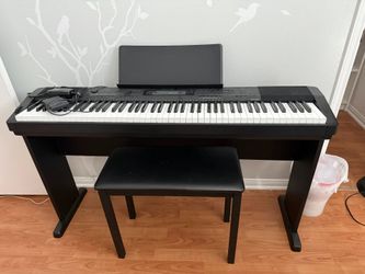 Casio CDP-230R with detachable sheet music stand, bench, and pedal.