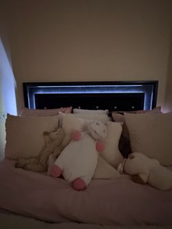 Black queen lighting up bed