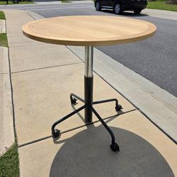 Round Adjustable-Height Table w/ Wheels – Wood Top & Black Base | $100
