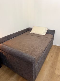 Gray Upholstered Daybed with Tufted Frame