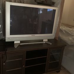 Tv Stand And Tv Panasonic 55” 