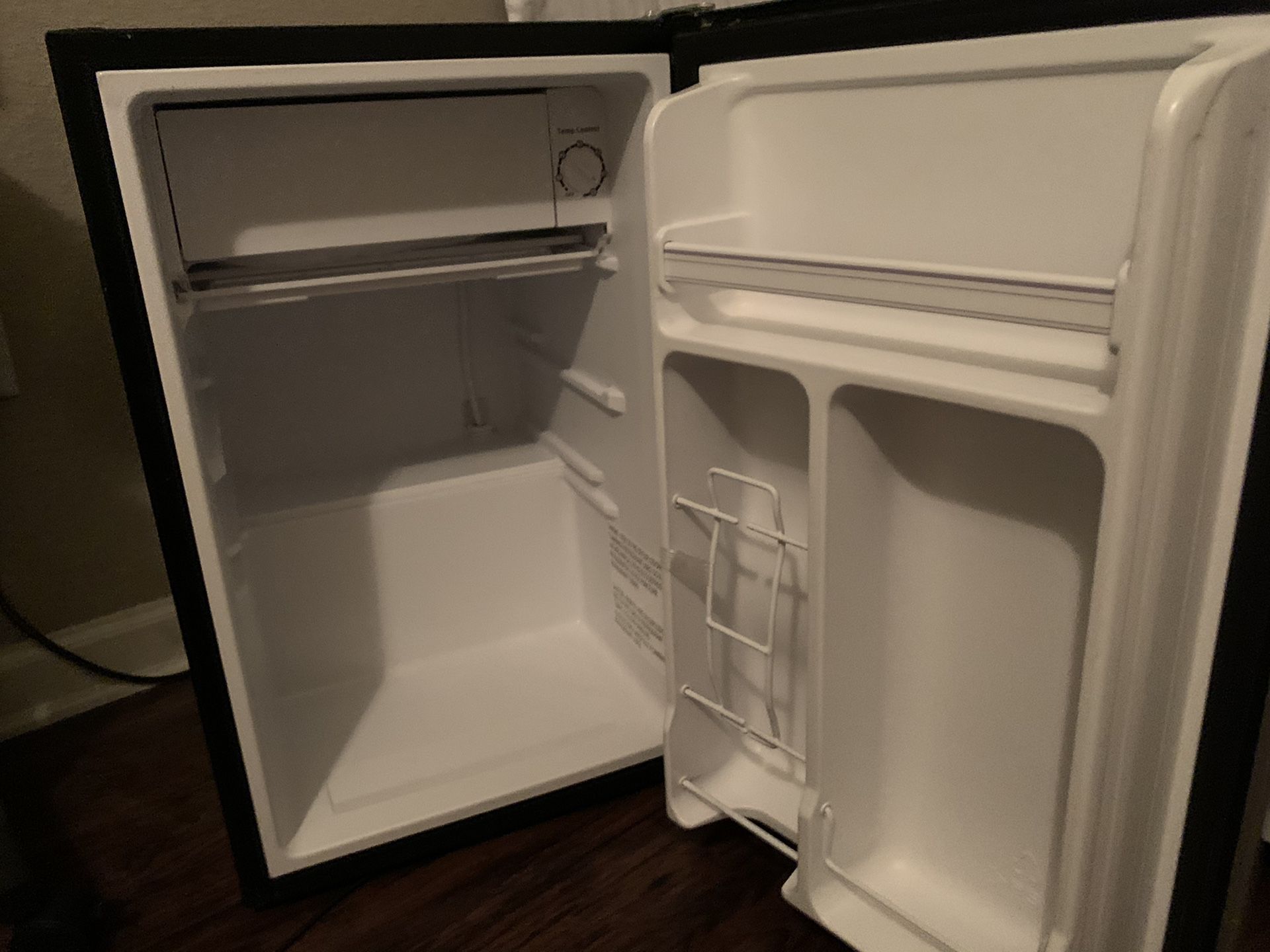 Black and silver Mini fridge