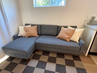 Modern Gray Sectional Sofa w/ Pull-Out Bed + Storage Chaise