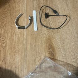 Fitbit With Its Cord 