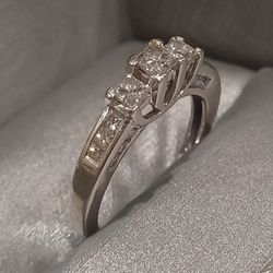 One and a half carrot diamond ring.