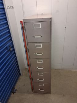 Letter size metal file cabinet with bar