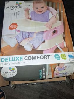 Folding booster seat/ silla de bebe