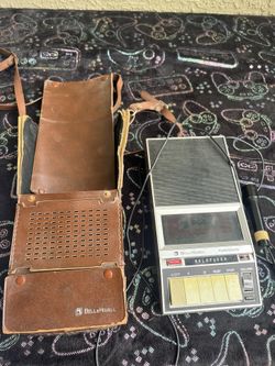 Vintage Bell & Howell Filmosound cassette recorder with bag and microphone.