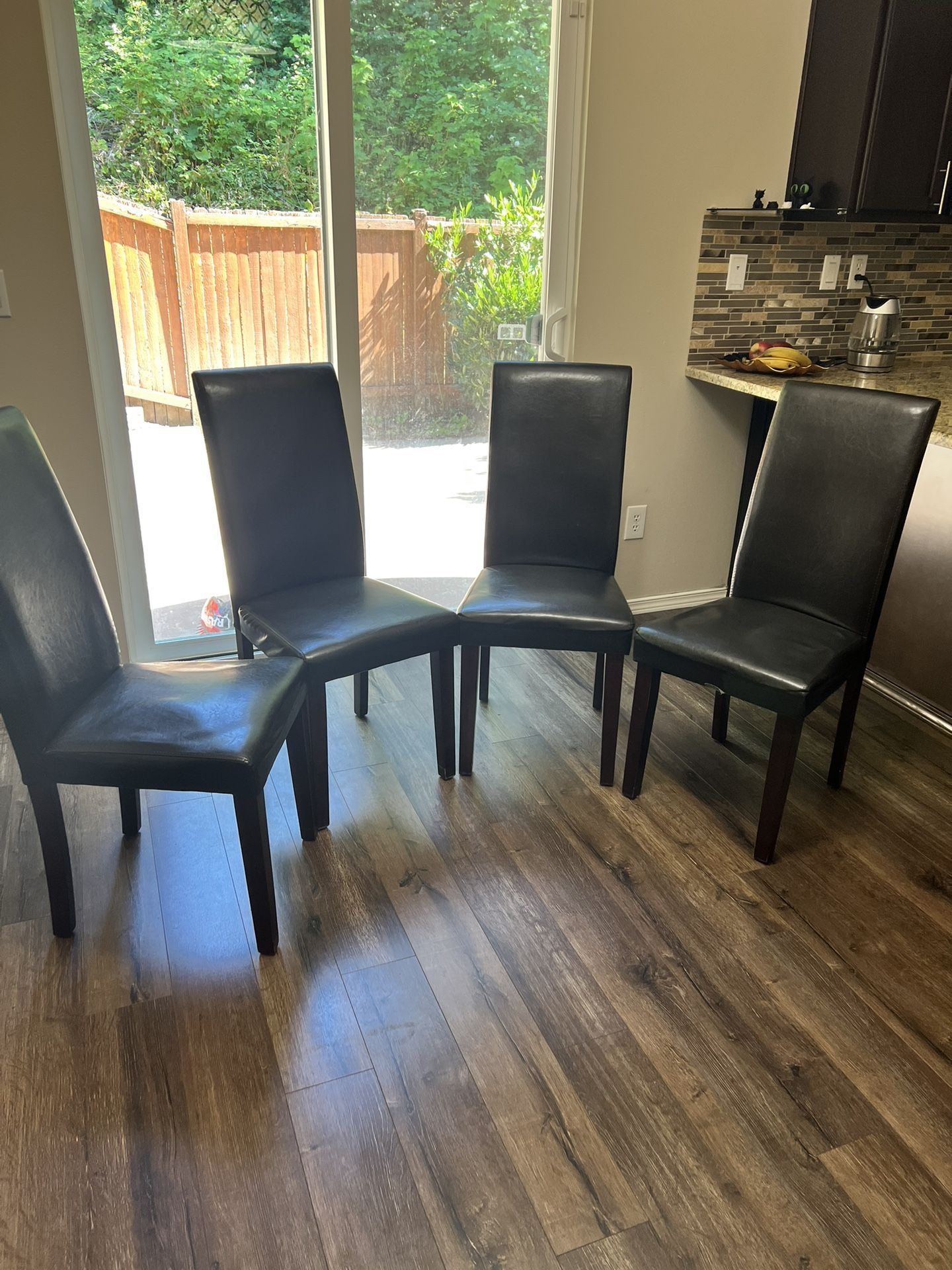 4 Dark Brown Leather Chairs $99