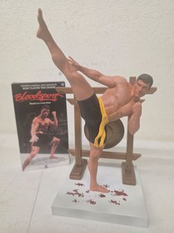 Bloodsport Van Damme Statue and VHS