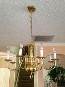 Selling Chandelier 8 candles holders gold. Very good condition.