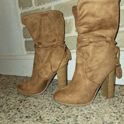 Swayed leather boots