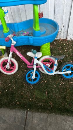 Boys and girls training bikes. No peddles