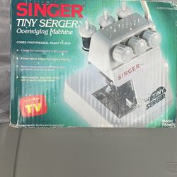Singer Overedging machine