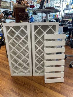 Set up to white custom made wood wine racks holds 28 bottles and matching hanging wine glass rack