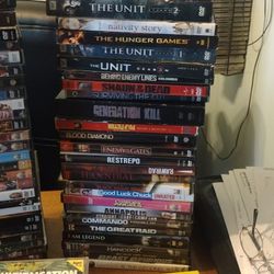 Over 60 DVDs And CDs For Sale