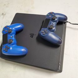 PS4 + 2 Controllers & Games 