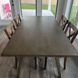 Brown wood table with chairs $500