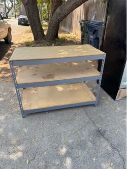 Heavy duty. Three tier metal shelf.