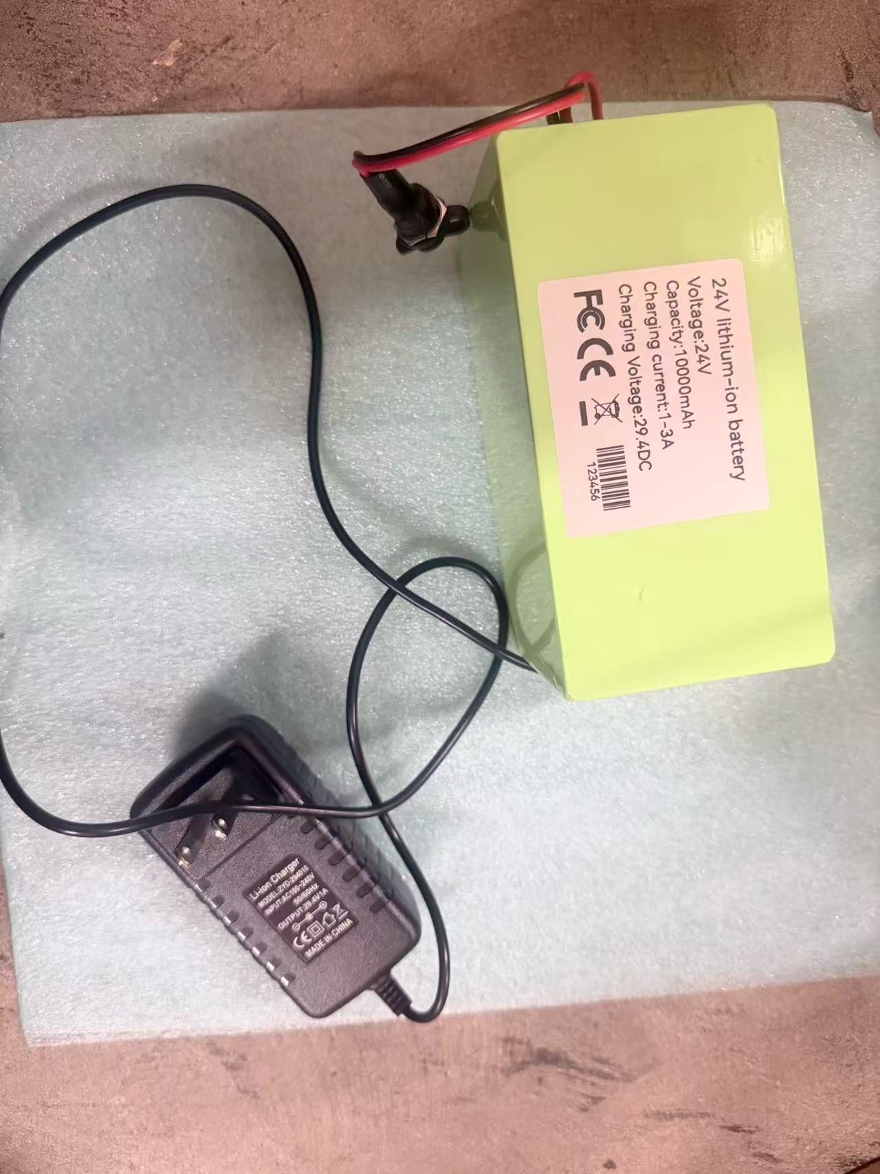 24V 10Ah Battery Pack for Ride on Toys and DIY Projects, 24V Rechargeable Lithium Battery with 29.4V 1A Charger 5.25*3.25*2.75(058)