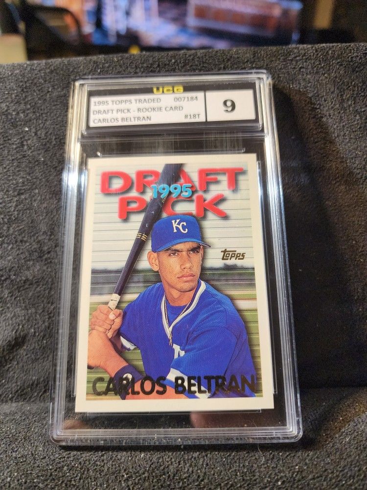 Topps Traded & Rookies #18T - Carlos Beltran (Juan LeBron Pictured) UCG MINT