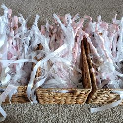 Light up Ribbon wands for party wedding holidays with fairy lights, jingle bells and ribbons attached
Baskets included for carrying wands

Condition i