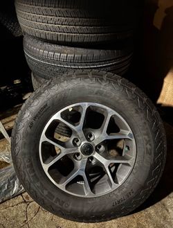 Jeep wrangler rims plus tires Oem wheel speed sensor included.