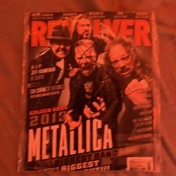 Autographed by Metallica/ larz ulrich and James Heitfeild.