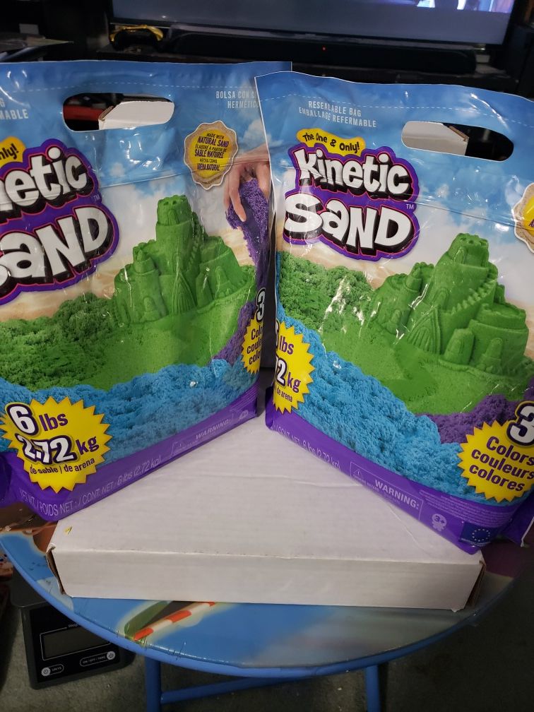 Kinetic sand Two 6 lb resealable bags with 3 different colors. In hand ready to ship any questions please ask.