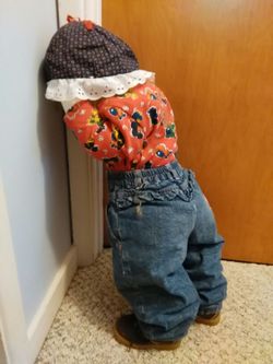 Hide in the corner hide and seek doll.