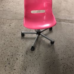 Pink color plastic desk chair