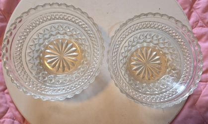 vintage Anchor Hocking Wexford clear pressed glass bowls featuring a diamond pattern and starburst design.