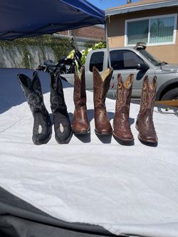 Three pairs of leather boots