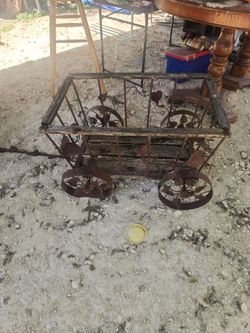 Wood and wrought iron garden wagon