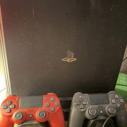 PlayStation 4 Pro (PS4) w/ Controllers