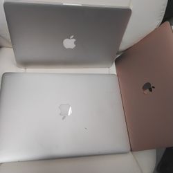 Two Mac Pros And Another Manbook