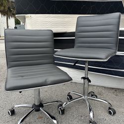 TWO Modern swivel ergonomic office chair ribbed faux leather
